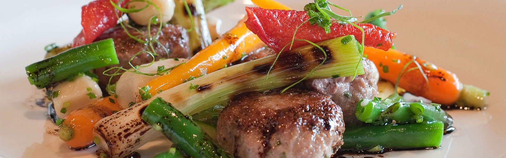 Lamb meatballs | goats cheese gnocchi | tomato confit | balsamic brown butter dressing